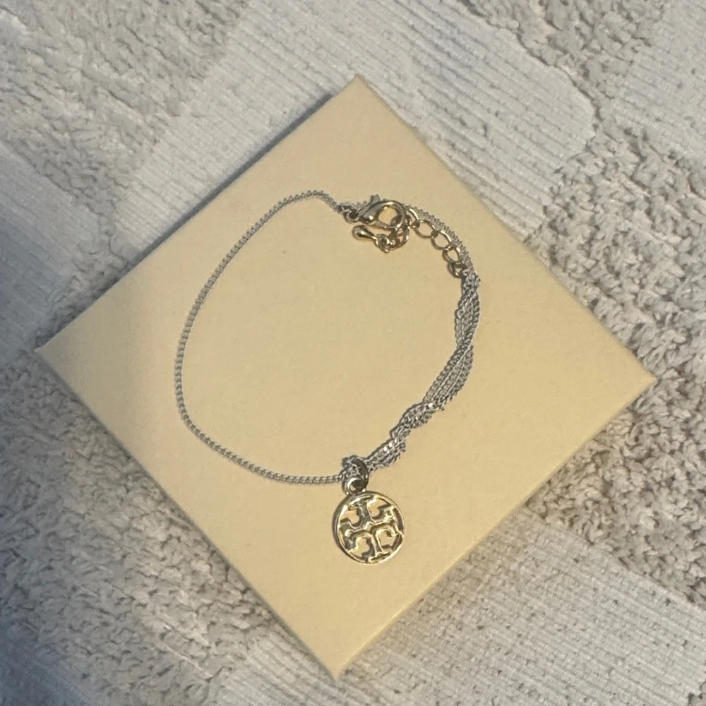 Tory Burch Gold white twisted bracelet - Picture 4 of 4